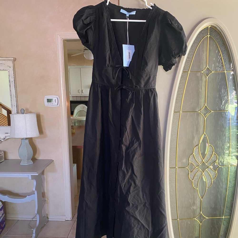 New with tags Hill House Sabrina dress in black Swiss dot.